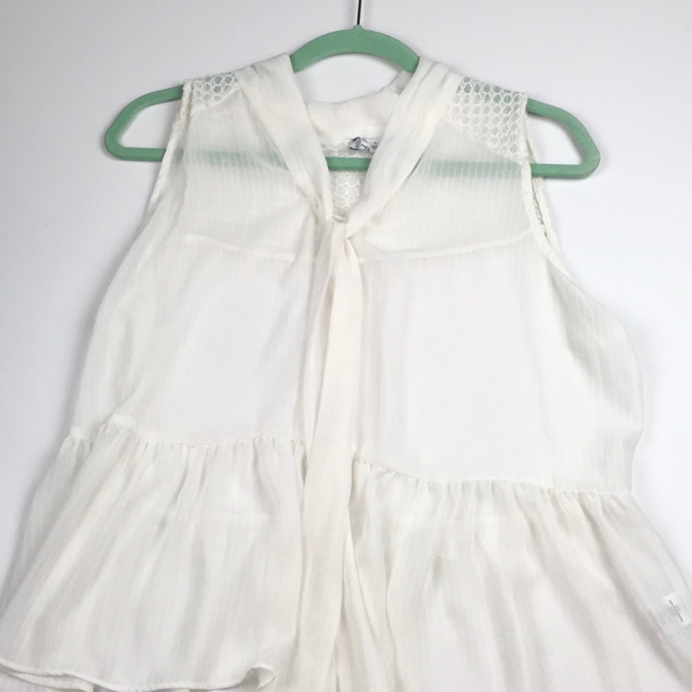 Ivory Sheer Peplum Style Blouse